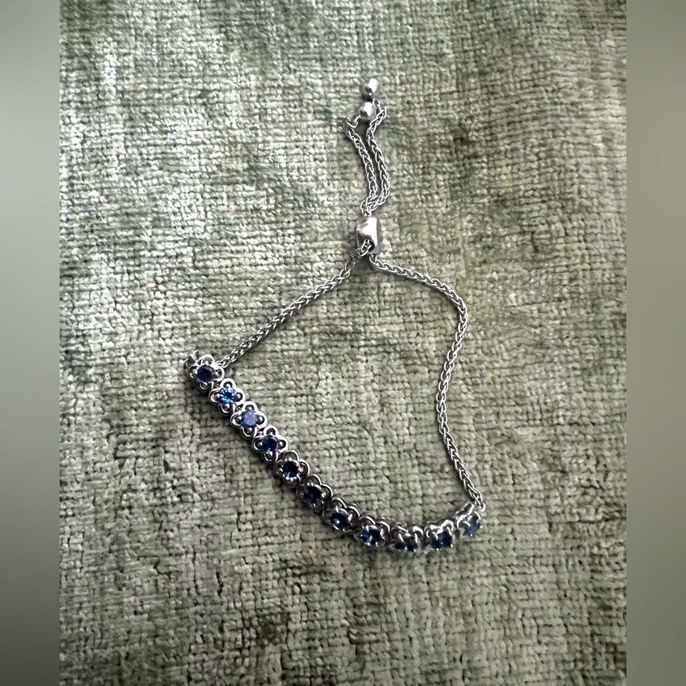Simulated, sapphire and sterling 925 silver adjustable bracelet.